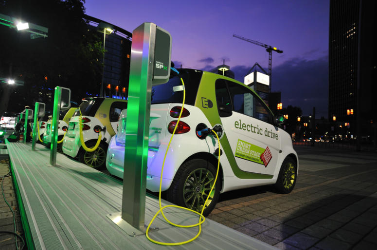 Electric cars charge at charging station Electric cars charge at charging station