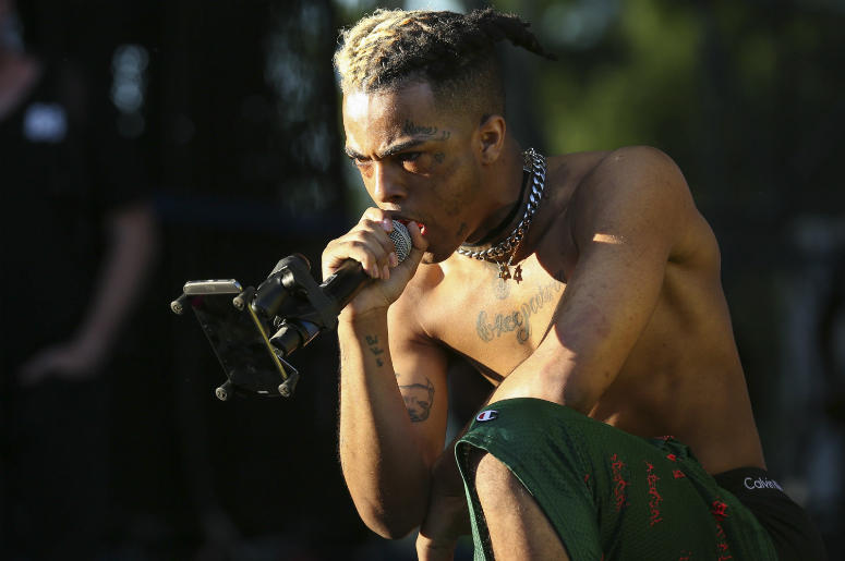 XXXTentacion XXXTentacion performs during the second day of the Rolling Loud Festival in downtown Miami on Saturday, May 6, 2017.