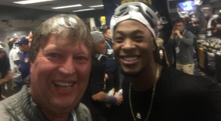 Keon Broxton dousing Chuck in Colorado as the team celebrates their series win!