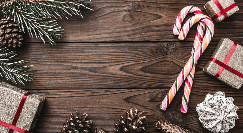 Fir tree, decorative cone, sweets, and gifts for holidays. Fir tree, decorative cone, sweets, and gifts for holidays.