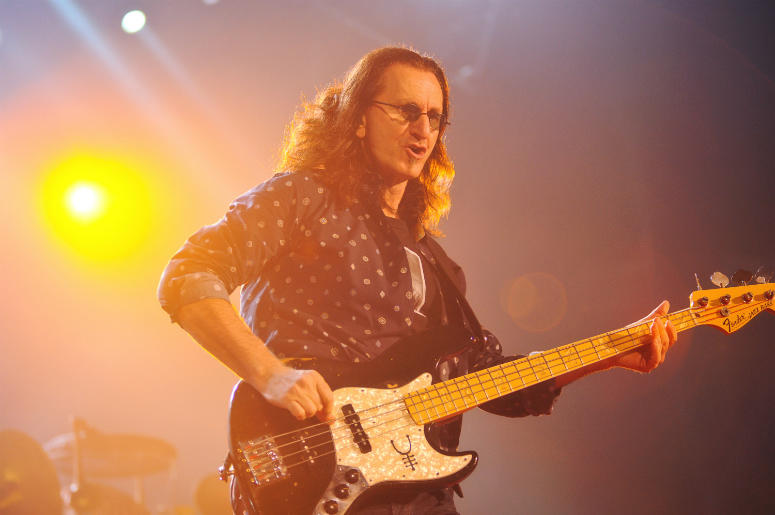 Geddy Lee, lead vocalist and bassist of iconic Canadian rock band Rush, performs on stage at Copps Coliseum Geddy Lee, lead vocalist and bassist of iconic Canadian rock band Rush, performs on stage at Copps Coliseum