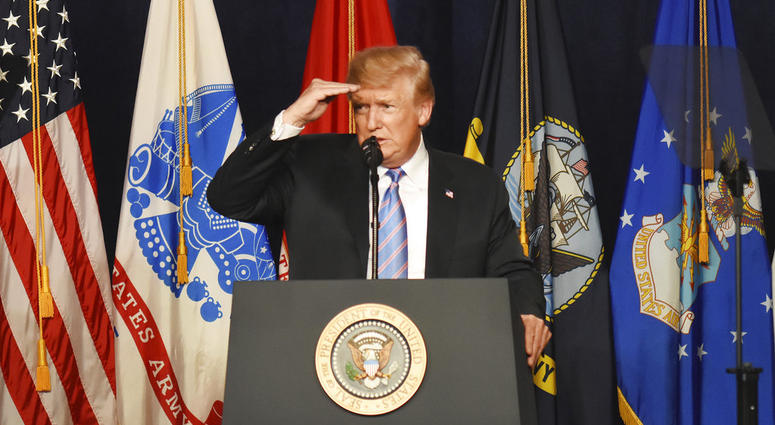 President Donald Trump looks at members of the audience during his remarks at a Salute to Service charity dinner in conjunction with the PGA Tour's Greenbrier Classic at The Greenbrier in White Sulphur Springs, W.Va. (AP Photo/Matt) President Donald Trump looks at members of the audience during his remarks at a Salute to Service charity dinner in conjunction with the PGA Tour's Greenbrier Classic at The Greenbrier in White Sulphur Springs, W.Va. (AP Photo/Matt)