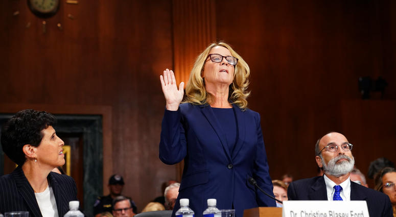 Christine Blasey Ford is sworn in to testify before the Senate Judiciary Committee on Capitol Hill in Washington, Thursday, Sept. 27, 2018. (AP Photo/Andrew Harnik, Pool)