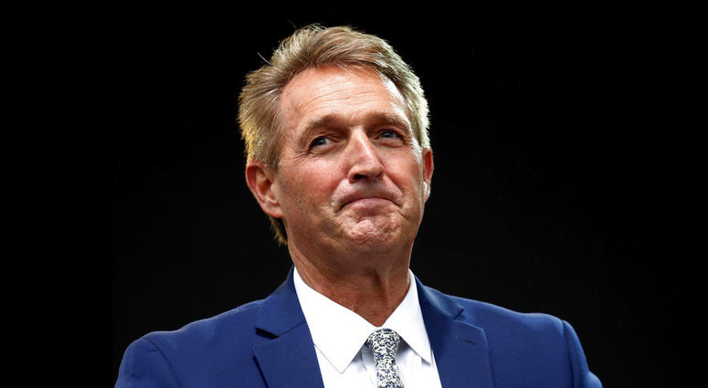 Sen. Jeff Flake, R-Ariz., listens to a question during an appearance at the Forbes 30 Under 30 Summit, Monday, Oct. 1, 2018, in Boston. (AP Photo/Mary Schwalm)