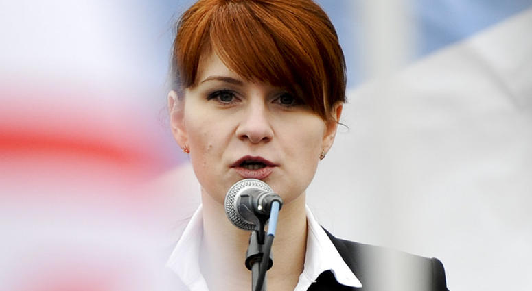 In this Sunday, April 21, 2013, file photo, Maria Butina, leader of a pro-gun organization in Russia, speaks to a crowd during a rally in support of legalizing the possession of handguns in Moscow, Russia.