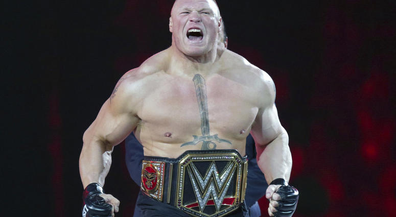 In this March 29, 2015, file photo, Brock Lesnar makes his entrance at Wrestlemania XXXI in Santa Clara, Calif. WWE is set to hold its Crown Jewel event Friday, Nov. 2, 2018, in Riyadh, Saudi Arabia, fans and politicians criticize WWE's decision