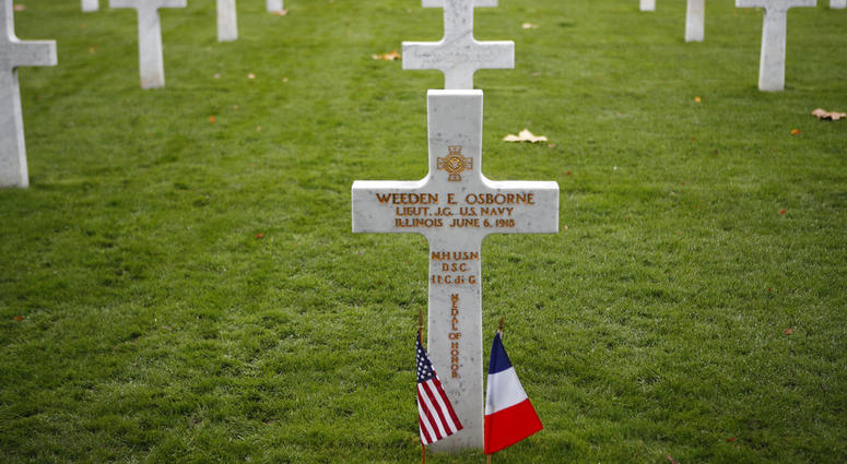 A soldier grave is pictured after a ceremony at the Aisne Marne American Cemetery near the Belleau Wood battleground, in Belleau, France, Saturday, Nov. 10, 2018