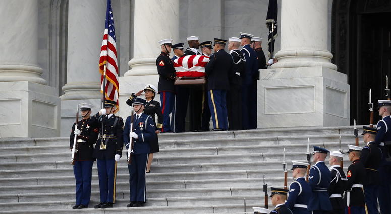 President Bush's casket leaving the U.S. Capitol