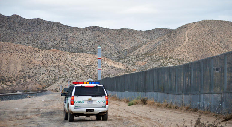 In this Jan. 4, 2016, file photo, a U.S. Border Patrol agent patrols Sunland Park along the U.S.-Mexico border next to Ciudad Juarez. (AP Photo/Russell Contreras, File)