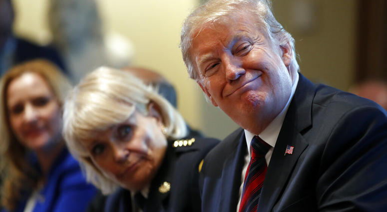 President Donald Trump leads a roundtable discussion on border security with local leaders, Friday, Jan. 11, 2019, in the Cabinet Room of the White House in Washington.