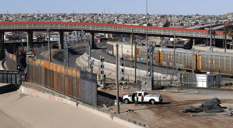 In this Tuesday, Jan. 22, 2019, photo, a new barrier is built along the Texas-Mexico border near downtown El Paso. (AP Photo/Eric Gay)