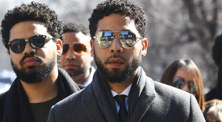 "Empire" actor Jussie Smollett, center, arrives at Leighton Criminal Court Building for a hearing to discuss whether cameras will be allowed in the courtroom during his disorderly conduct case on Tuesday, March 12, 2019, in Chicago. (AP Photo/Matt Marton) "Empire" actor Jussie Smollett, center, arrives at Leighton Criminal Court Building for a hearing to discuss whether cameras will be allowed in the courtroom during his disorderly conduct case on Tuesday, March 12, 2019, in Chicago. (AP Photo/Matt Marton)