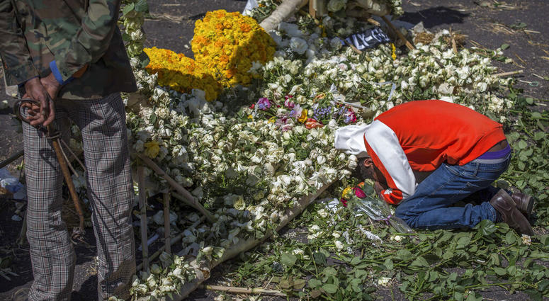 A mourner at the site of the Ethiopian plane crash