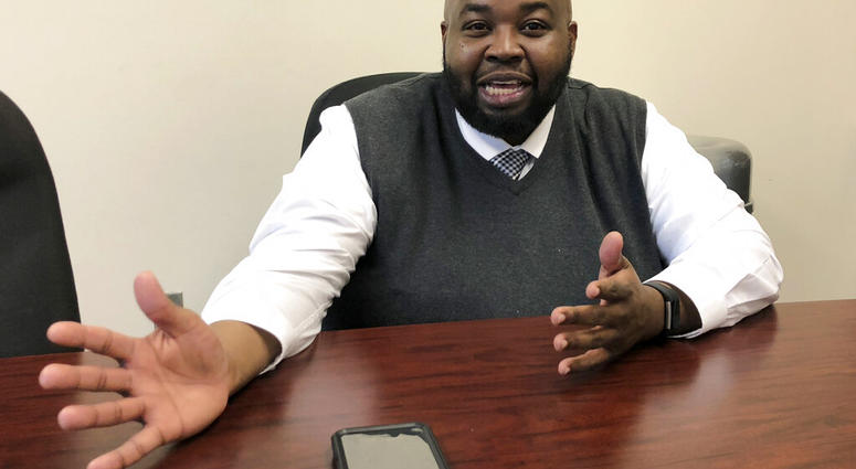 In this Thursday, April 18, 2019 photo Rodney Robinson, of Richmond, Va., gestures during an interview at the Virgie Binford Educational Center, a school inside the Richmond Juvenile Detention Center in Richmond, Va. (AP Photo/Denise Levoie) In this Thursday, April 18, 2019 photo Rodney Robinson, of Richmond, Va., gestures during an interview at the Virgie Binford Educational Center, a school inside the Richmond Juvenile Detention Center in Richmond, Va. (AP Photo/Denise Levoie)