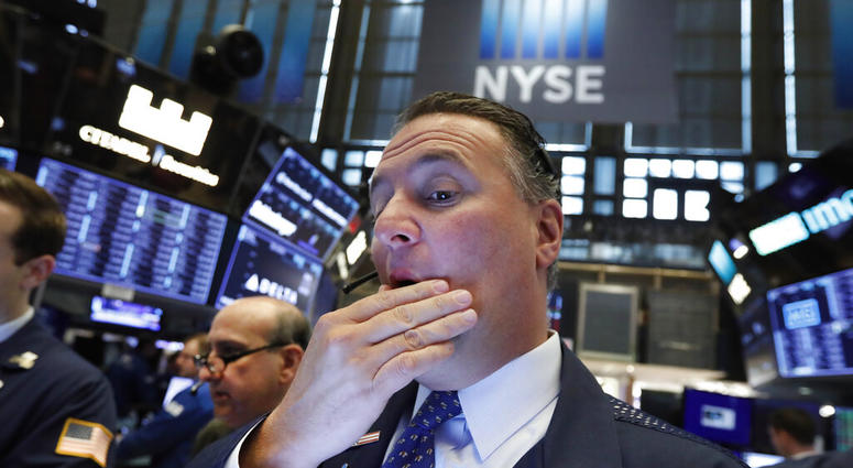 In this May 9, 2019, file photo trader Jonathan Corpina works on the floor of the New York Stock Exchange. The U.S. stock market opens at 9:30 a.m. EDT on Monday, May 13. (AP Photo/Richard Drew, File)