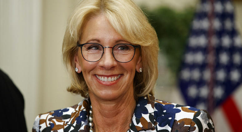 In this May 3, 2017, file photo Education Secretary Betsy DeVos speaks during a school choice event in the Roosevelt Room of the White House in Washington. (AP Photo/Evan Vucci, File)