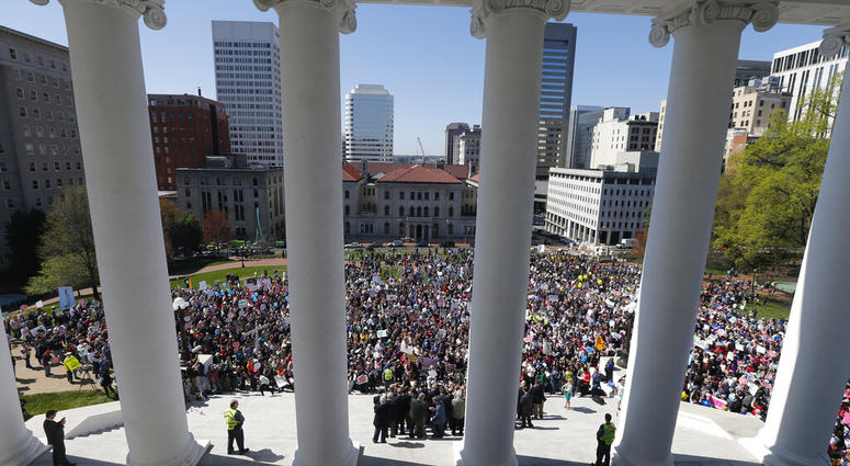 FILE - In this April 3, 2019, file photo, Right to Life marchers gather on the steps of the Capitol to listen to speakers in Richmond, Va. As abortion opponents cheer the passage of fetal heartbeat laws and other restrictions on the procedure, abortion-ri