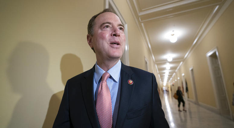 House Intelligence Committee Chairman Adam Schiff, D-Calif., responds to reporters as he arrives for an open hearing on China, at the Capitol in Washington, Thursday, May 16, 2019. (AP Photo/J. Scott Applewhite)