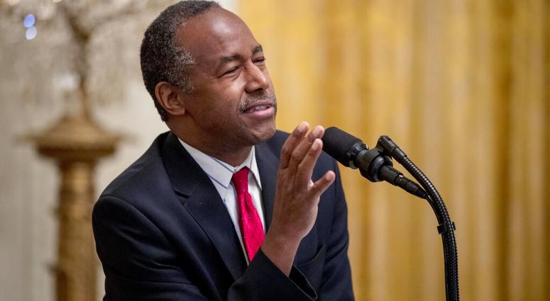 In this Oct. 26, 2018, file photo, Housing and Urban Development Secretary Ben Carson speaks to the audience before President Donald Trump speaks at the 2018 Young Black Leadership Summit in the East Room of the White House. (AP Photo/Andrew Harnik, File)