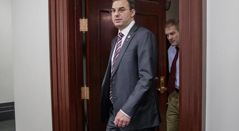FILE - This March 28, 2017, file photo shows Rep. Justin Amash, R-Mich., followed by Rep. Jim Jordan, R-Ohio, leaving a closed-door strategy session on Capitol Hill in Washington. (AP Photo/J. Scott Applewhite, File) FILE - This March 28, 2017, file photo shows Rep. Justin Amash, R-Mich., followed by Rep. Jim Jordan, R-Ohio, leaving a closed-door strategy session on Capitol Hill in Washington. (AP Photo/J. Scott Applewhite, File)