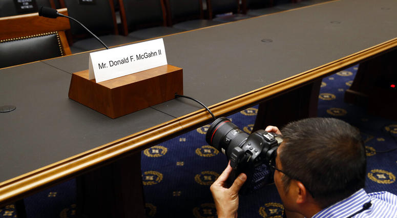 A photojournalist photographs a name placard for former White House Counsel Don McGahn, who is not expected to appear before a House Judiciary Committee hearing, Tuesday, May 21, 2019, on Capitol Hill in Washington. (AP Photo/Patrick Semansky) A photojournalist photographs a name placard for former White House Counsel Don McGahn, who is not expected to appear before a House Judiciary Committee hearing, Tuesday, May 21, 2019, on Capitol Hill in Washington. (AP Photo/Patrick Semansky)