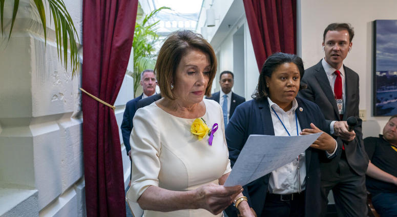 Speaker of the House Nancy Pelosi, D-Calif., departs a meeting with the Democratic Caucus where members heard from former CIA Director John Brennan about the situation in Iran. (AP Photo/J. Scott Applewhite) Speaker of the House Nancy Pelosi, D-Calif., departs a meeting with the Democratic Caucus where members heard from former CIA Director John Brennan about the situation in Iran. (AP Photo/J. Scott Applewhite)