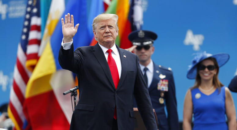President Donald Trump waves as he takes the stage to speak at the U.S. Air Force Academy graduation Thursday, May 30, 2019 at Air Force Academy, Colo. (AP Photo/David Zalubowski)