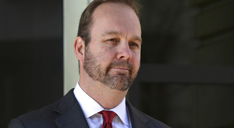FILE - In this Dec. 11, 2017, file photo, Rick Gates, departs federal court in Washington. House intelligence committee has issued subpoenas for former national security adviser Michael Flynn and Rick Gates, a former Trump campaign aide. (AP Photo/Susan W