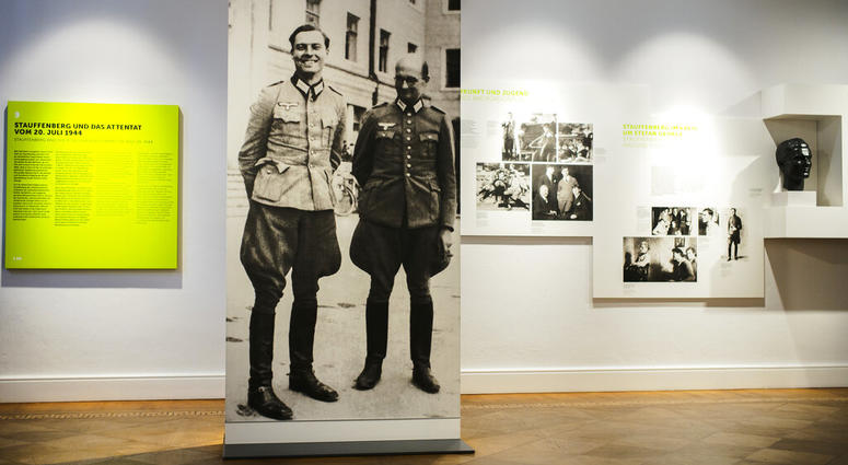 In this Friday, July 12, 2019 photo a picture of Claus Schenk Graf von Stauffenberg, left, and Albrecht Ritter Merz von Quirnheim is displayed a the exhibition at the German Resistance Memorial Center inside the Bendlerblock building of the defensive mini