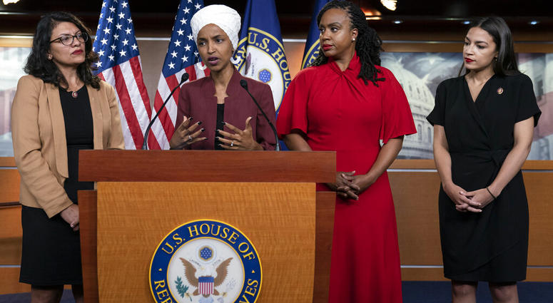 Rep. Ilhan Omar, D-Minn., responds to base remarks by President Donald Trump after he called for four Democratic congresswomen of color to go back to their "broken" countries. (AP Photo/J. Scott Applewhite)