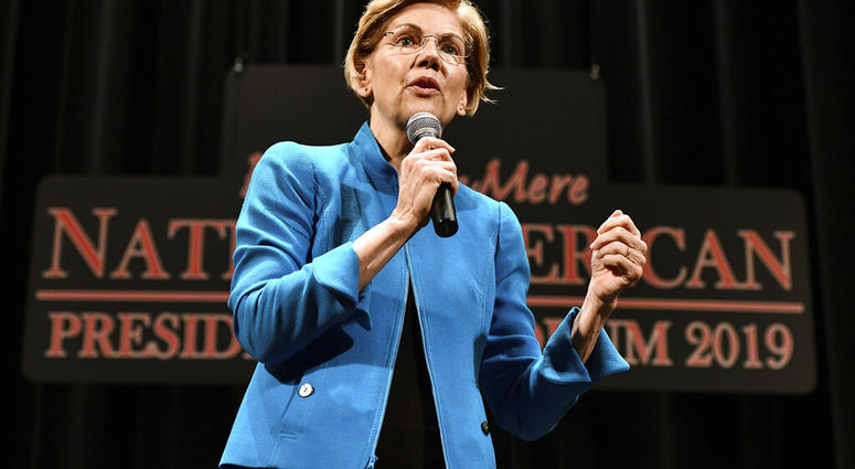 Elizabeth Warren, 2020 Democratic presidential hopeful, speaks during the first day of the Frank LaMere Native American Presidential Forum held Monday, Aug. 19, 2019 at the Orpheum Theatre in Sioux City, Iowa. (Tim Hynds/Sioux City Journal via AP)