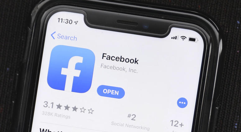 FILE - In this July 30, 2019, file photo, the social media application, Facebook is displayed on Apple's App Store. Facebook is launching a long-promised tool that lets users block the social network from gathering information about them on outside websit
