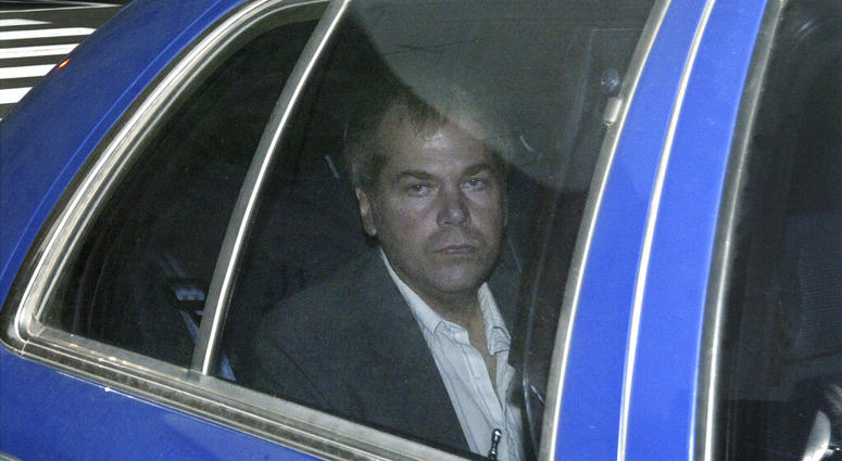 FILE - In this Nov. 18, 2003 file photo, John Hinckley Jr. arrives at U.S. District Court in Washington. The man who tried to assassinate President Ronald Reagan is interested in getting a job in the music industry, possibly in California.