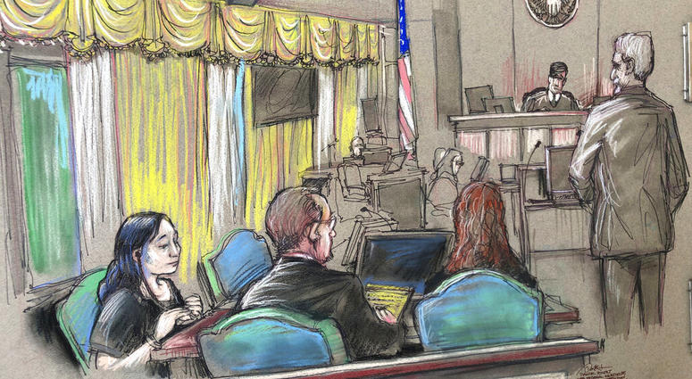 FILE - In this April 15, 2019, file court sketch, Yujing Zhang, left, a Chinese woman charged with lying to illegally enter President Donald Trump's Mar-a-Lago club, listens to a hearing before Magistrate Judge William Matthewman in West Palm Beach, Fla.
