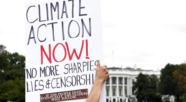 Activists protest during a rally outside the White House in Washington, Friday, Sept. 13, 2019. (AP Photo/Susan Walsh) Activists protest during a rally outside the White House in Washington, Friday, Sept. 13, 2019. (AP Photo/Susan Walsh)