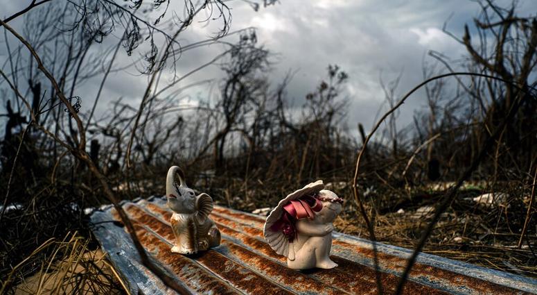 Porcelain figures rest among the remains of a shattered house at the aftermath of Hurricane Dorian in Freetown, Grand Bahama, Bahamas, Friday Sept. 13, 2019. Porcelain figures rest among the remains of a shattered house at the aftermath of Hurricane Dorian in Freetown, Grand Bahama, Bahamas, Friday Sept. 13, 2019.