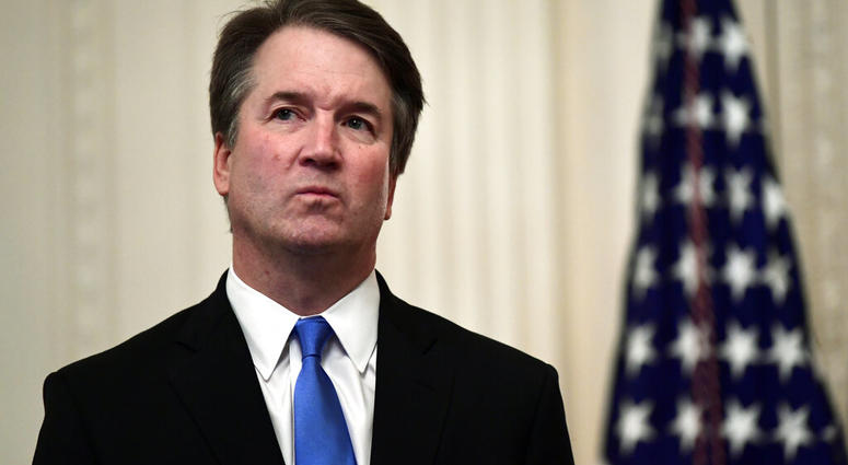 FILE - In this Oct. 8, 2018, file photo, Supreme Court Justice Brett Kavanaugh stands before a ceremonial swearing-in in the East Room of the White House in Washington. (AP Photo/Susan Walsh, File) FILE - In this Oct. 8, 2018, file photo, Supreme Court Justice Brett Kavanaugh stands before a ceremonial swearing-in in the East Room of the White House in Washington. (AP Photo/Susan Walsh, File)