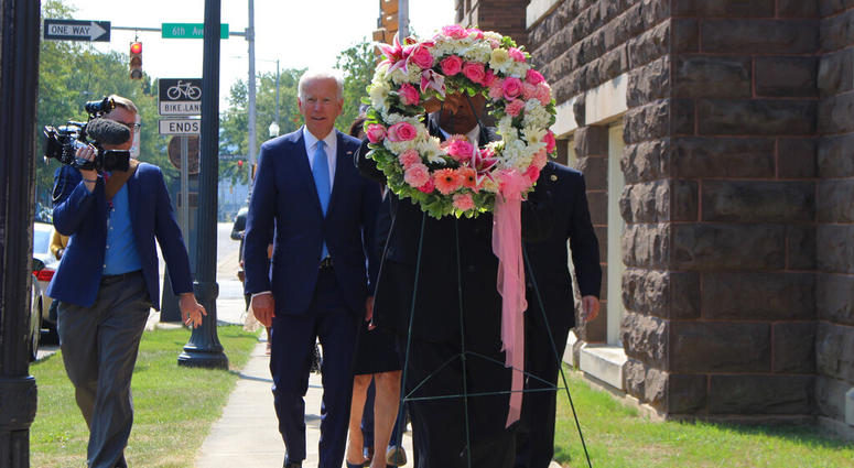Former Vice President and presidential candidate Joe Biden, center left, joins Sen. Doug Jones and Birmingham Mayor Randall Woodfin at a wreath laying after a service at 16th Street Baptist Church in Birmingham, Ala. (Ivana Hrynkiw/The Birmingham News via Former Vice President and presidential candidate Joe Biden, center left, joins Sen. Doug Jones and Birmingham Mayor Randall Woodfin at a wreath laying after a service at 16th Street Baptist Church in Birmingham, Ala. (Ivana Hrynkiw/The Birmingham News via
