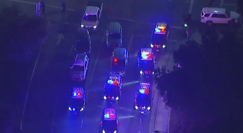Police vehicles block an intersection in the vicinity of a shooting in Thousand Oaks, California, early Thursday, Nov. 8, 2018. (KABC via AP)