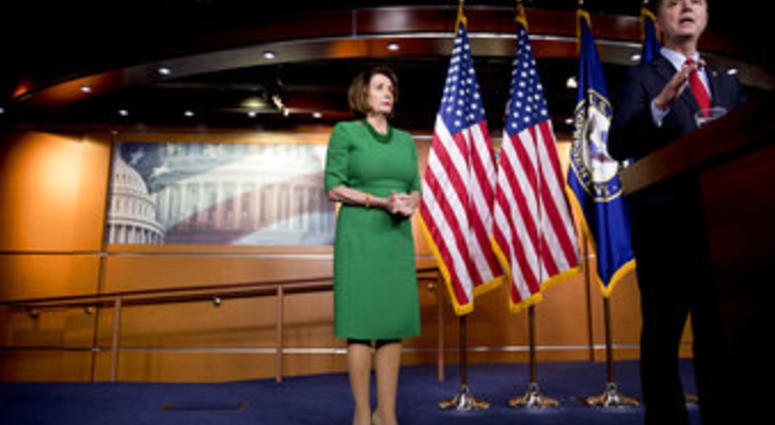 Rep. Adam Schiff, D-Calif., Chairman of the House Intelligence Committee, right, accompanied by House Speaker Nancy Pelosi of Calif., left, speaks about the House impeachment inquiry into President Donald Trump. (AP Photo/Andrew Harnik)