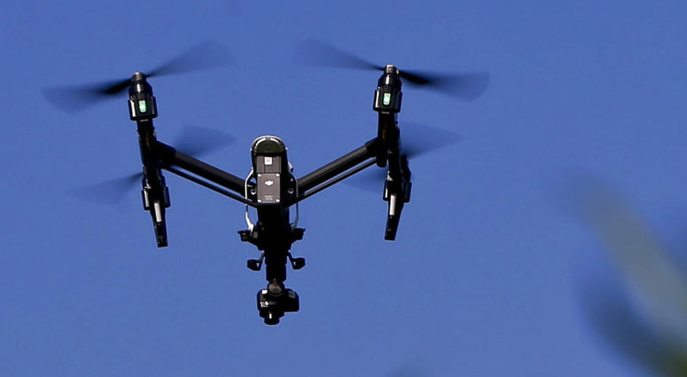 FILE - In this July 11, 2018 file photo, s drone equipped with a thermal camera flies over the plants at the Pennsylvania Department of Natural Resources' Jennings Environmental Education Center on Wednesday, July 11, 2018 in Slippery Rock, Pa. An aviatio