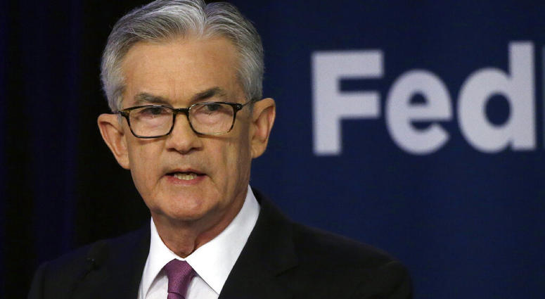 FILE - In this June 4, 2019, file photo Federal Reserve Chairman Jerome Powell speaks at a conference involving its review of its interest-rate policy strategy and communications in Chicago. (AP Photo/Kiichiro Sato, File)