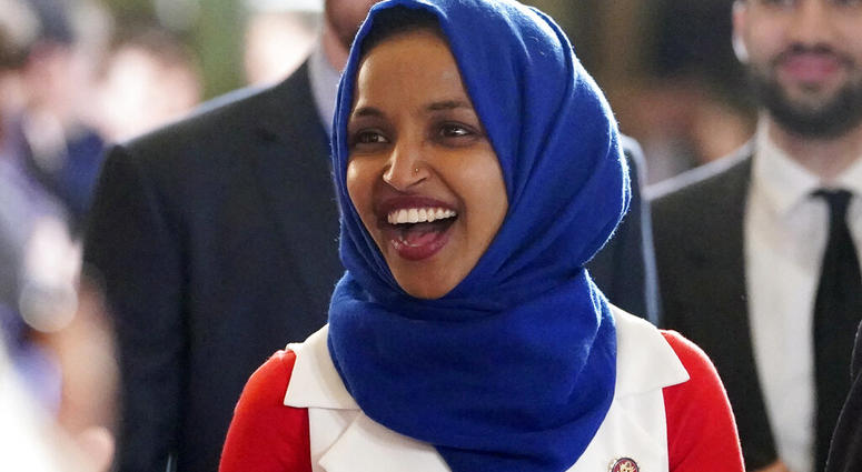 In this Feb. 5, 2019 photo, Rep. Ilhan Omar, D-Minn., arrives for President Donald Trump's State of the Union address to a joint session of Congress on Capitol Hill in Washington. (AP Photo/Carolyn Kaster)