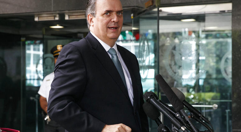 Marcelo Ebrard, Mexico's Secretary of Foreign Affairs, speaks to the media as he leaves a meeting about tariffs at the State Department, Thursday June 6, 2019, in Washington. (AP Photo/Jacquelyn Martin)
