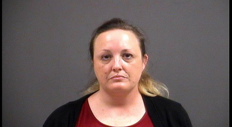 Caitlin Poytress, 39, has been charged with three counts of child endangerment, possession of a schedule II drug, possession with intent to distribute a schedule III drug, and other charges. (Chesterfield Police)