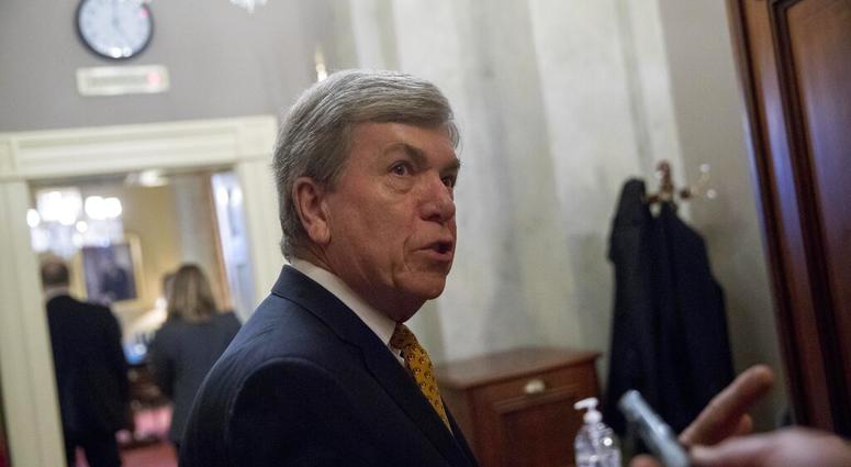 Rep. Roy Blunt, R-Mo., speaks to reporters as he walks into a meeting with Republican Senate leadership at the offices of Senate Majority Leader Mitch McConnell of Ky. on Capitol Hill, Monday, Feb. 11, 2019, in Washington. (AP Photo/Andrew Harnik)