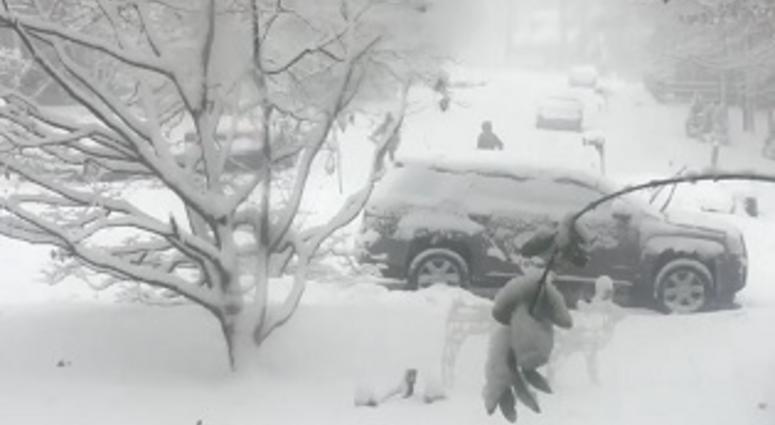 Kids play in the heavy snow in Midlothian on December 9, 2018. (Matt Demlein, WRVA)