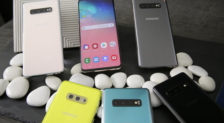 In this Tuesday, Feb. 19, 2019, photo is a selection of the new Samsung Galaxy S10 smartphones during a product preview in San Francisco. (AP Photo/Eric Risberg)