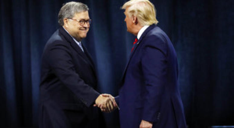 President Donald Trump shakes hands with Attorney General William Barr before Trump signed an executive order creating a commission to study law enforcement and justice. (AP Photo/Charles Rex Arbogast)