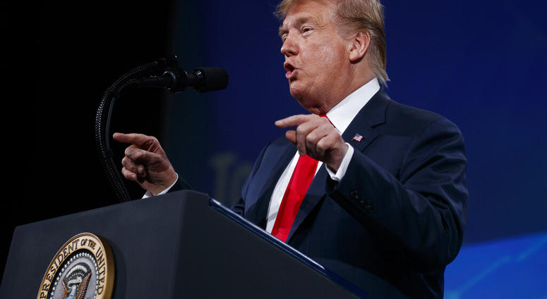 President Donald Trump speaks to the annual meeting of the National Rifle Association, Friday, April 26, 2019, in Indianapolis. (AP Photo/Evan Vucci)